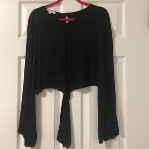 Black flowy long sleeve top.